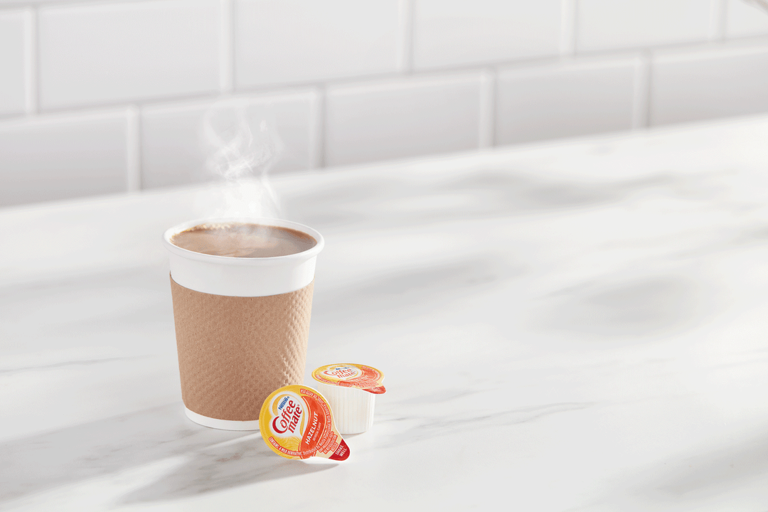 Coffee-Mate Hazelnut Single Serve Liquid Creamer-0.375 oz.-180/Case