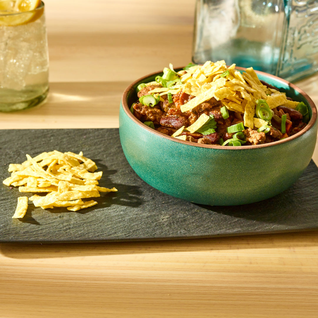 Fresh Gourmet Lightly Salted Tortilla Strips Salad Topping Single Serve-0.5 oz.-140/Case